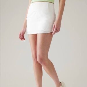 NWT, ATHLETA RUN WITH IT 14" SKORT, SIZE XS, BRIGHT WHITE